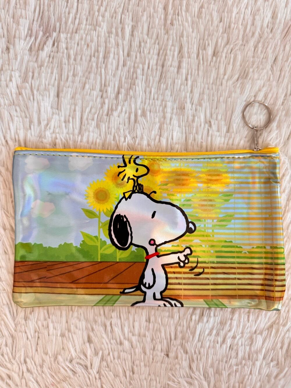 Snoopy & Woodstock pencil case with Snoopy and Woodstock in front of sunflowers